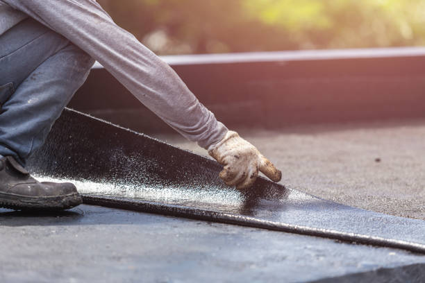 Professional Basement Waterproofing technician working in Trinway, OH